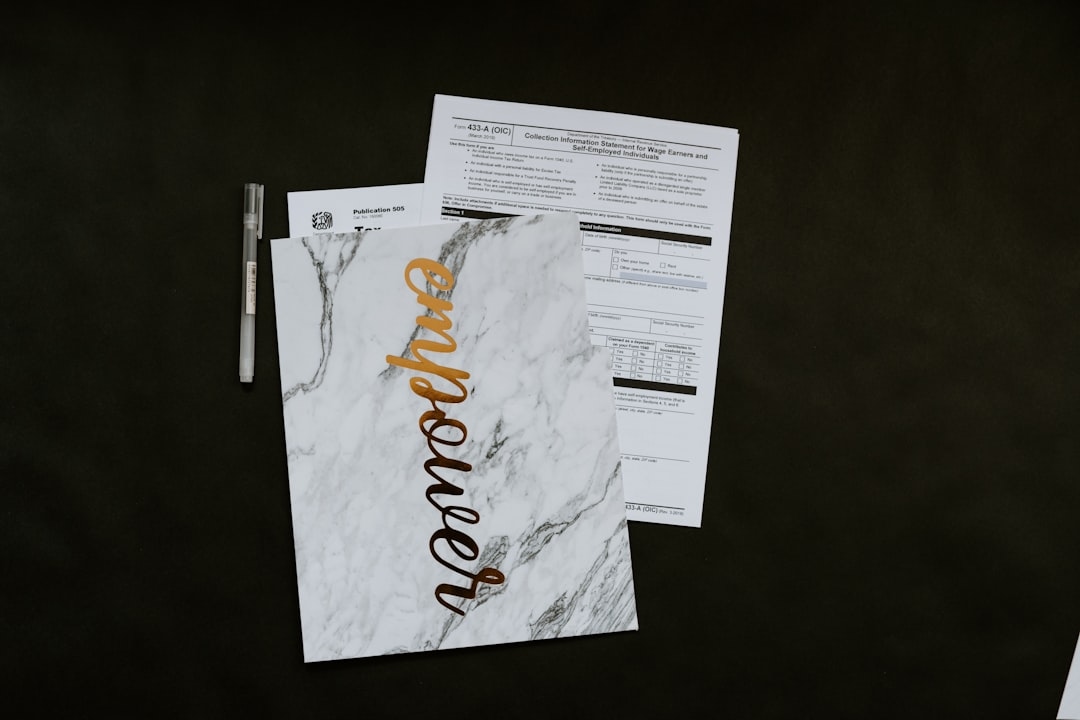 Quarterly subscription review report on a desk in Namur